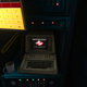 A computer resembling old, early Apple II models displays the Ghostbusters logo and underneath, in barely legible text, words from the song "Ghostbusters" by Ray Parker, Jr.